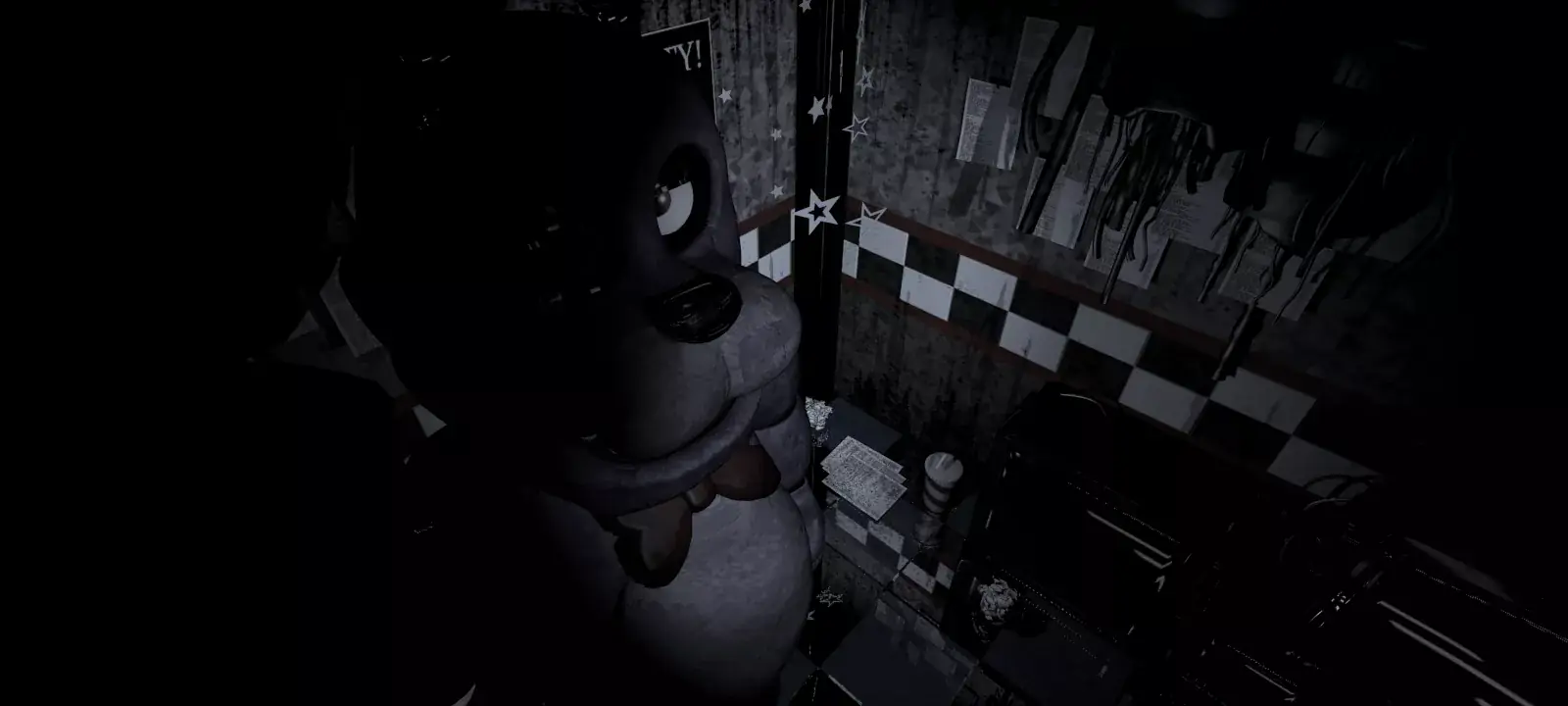 Bonnie close to the lens on the West Hall Corner camera, bow tie visible.