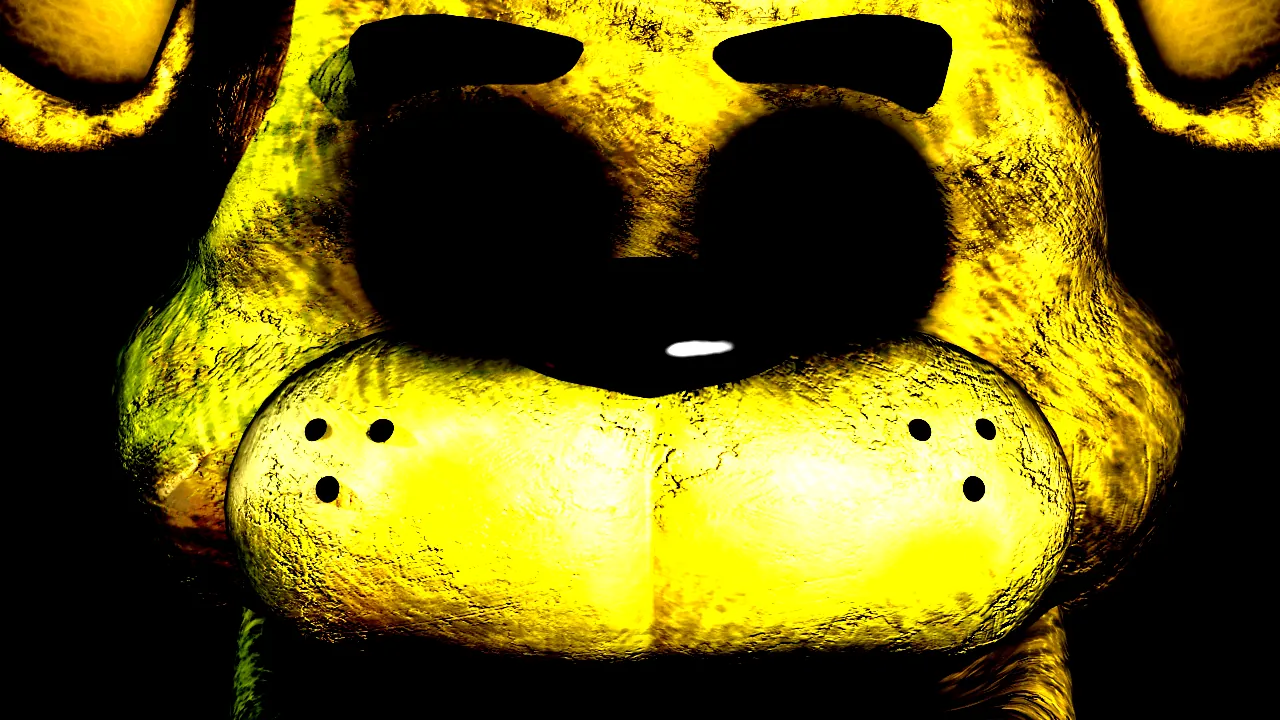 Close-up of Golden Freddy's yellow face, with empty black eyes and a small white mark on the nose.